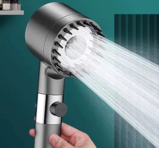 Cabezal de ducha gris con botón de parada