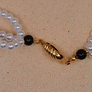 Collana due fili nero, oro, bianco