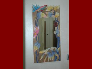 Specchio decorativo in legno intagliato vintage