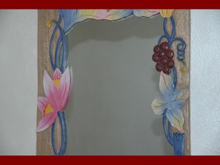 Specchio decorativo in legno intagliato vintage