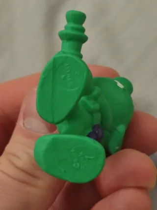 Astrosniks figura verde con arma