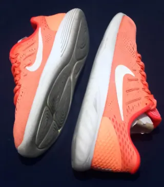 Zapatillas Nike Running Naranja y Rosa