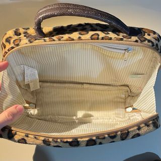 Beauty case leopardato con cuore