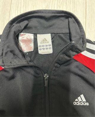 Giacca Adidas nera e rossa