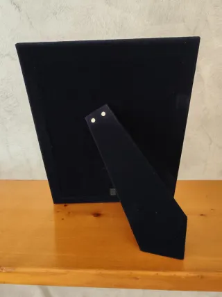 Cornice in argento martellato