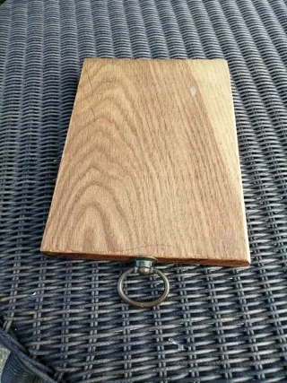 Tris taglieri antichi in legno e metallo