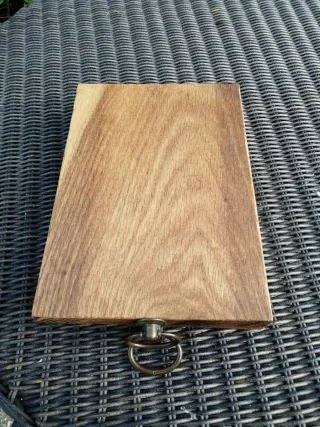 Tris taglieri antichi in legno e metallo