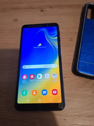 Samsung Galaxy A7 Azul con funda y cargador