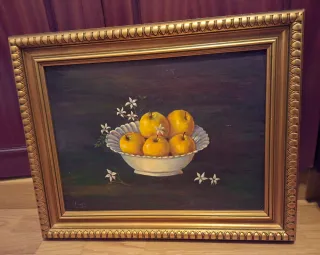 Pintura al óleo con marco dorado