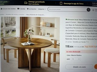 Mesa comedor redonda de madera marrón rústico.