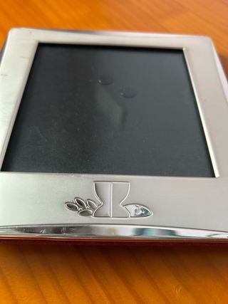 Marco de fotos plateado de metal