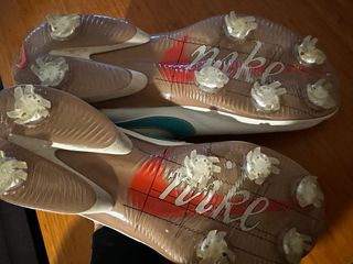 Tenis de golf Nike blancos y turquesa