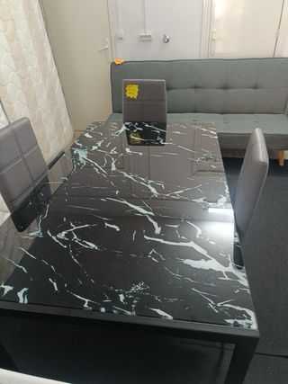Mesa de cristal con 6 sillas