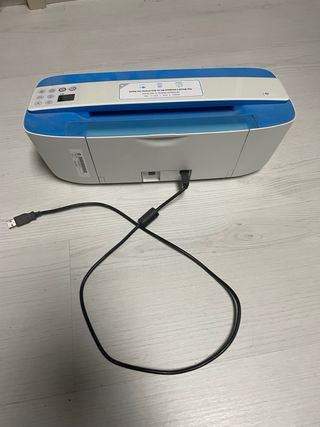Impresora HP multifunción azul y blanca