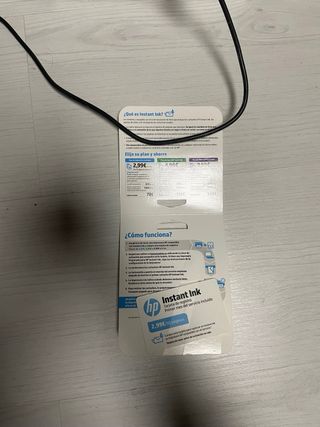 Impresora HP multifunción azul y blanca