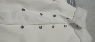 Abrigo largo blanco con cuello y puños de pelo