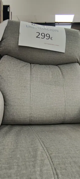 Poltrona relax con meccanismo a spinta in tessuto grigio