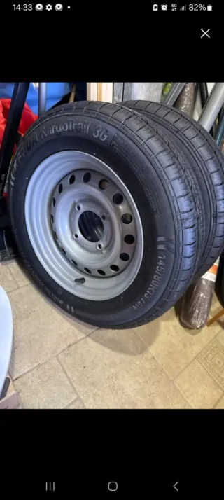 Barco Hobby 4 con remolque y motor fueraborda