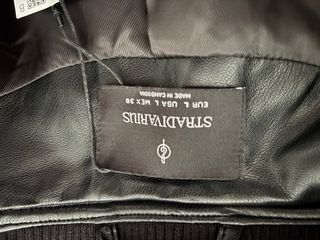 Chaqueta bolera negra efecto piel