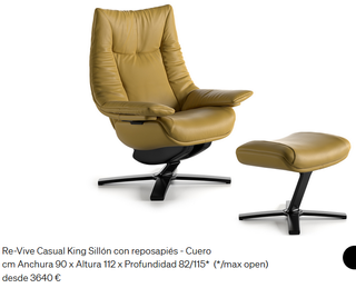 Butaca de piel beige con reposapiés y apoyacabezas