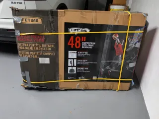 Canasta de baloncesto portátil y altura ajustable