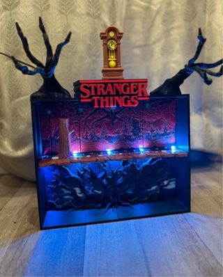 Expositor Stranger Things con Luz