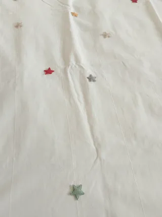 Cortinas blancas con estrellas para habitación inf