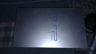 Consola PS2 Plateada+2 mandos+vertical stand