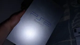 Consola PS2 Plateada+2 mandos+vertical stand