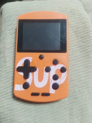 Consola Portátil SUP Naranja con 500 juego