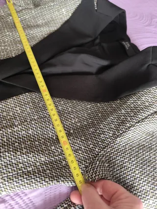 Chaqueta de fiesta gris y negra