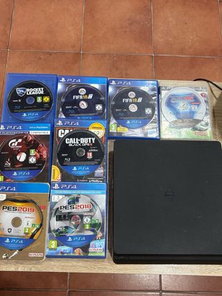PS4 Slim 1TB + mando + Volante + 8 Juegos