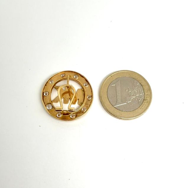 Pendientes MK de 18k con circonitas. Peso: 10.9gr