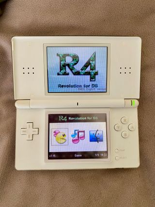 Nintendo DS Lite + funda y varios juegos