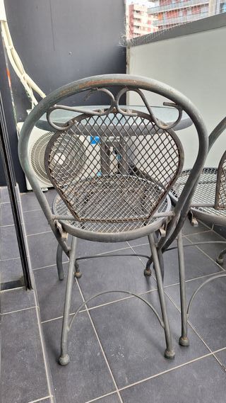 Mesa y 2 sillas de hierro forjado para exterior