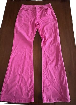Pantaloni donna rosa a zampa