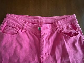 Pantaloni donna rosa a zampa