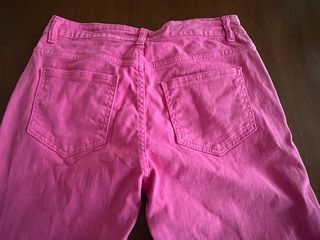 Pantaloni donna rosa a zampa