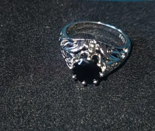 Anillo Plata 925, Talla 11 con una piedra central.