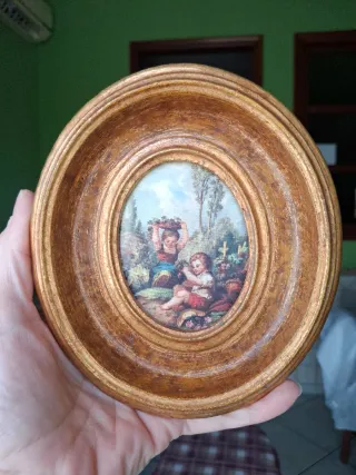 Quadro d'epoca ovale con cornice dorata
