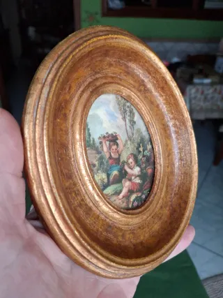 Quadro d'epoca ovale con cornice dorata