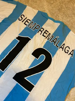 Camiseta Málaga FC Rayas Azul y Blanca