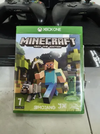 Xbox One con 2 mandos y fuente