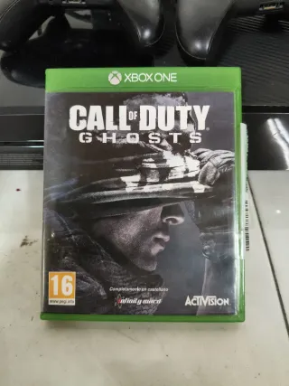 Xbox One con 2 mandos y fuente