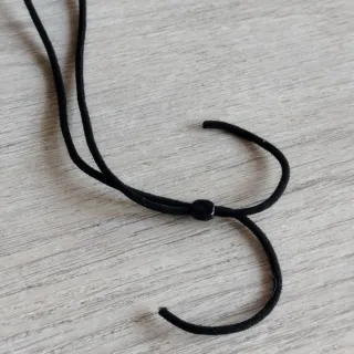 Corbata pedrería negra y plateada