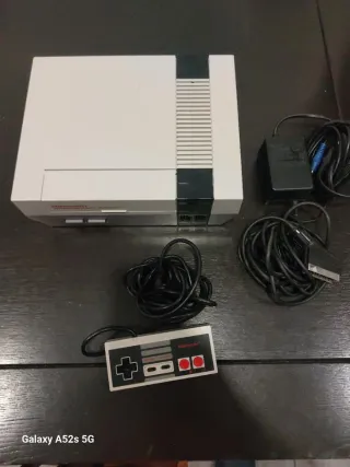 Consola Nintendo NES con accesorios