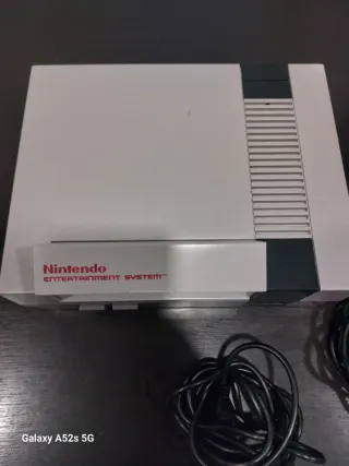 Consola Nintendo NES con accesorios