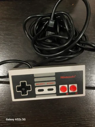 Consola Nintendo NES con accesorios