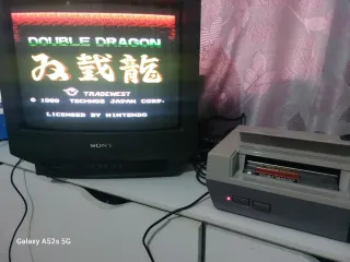 Consola Nintendo NES con accesorios