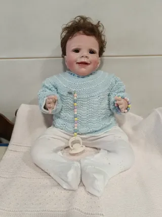 Muñeco bebé reborn con chupete